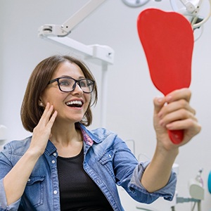 Woman with dental implants in Los Angeles