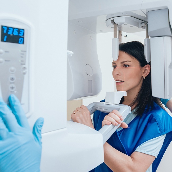 Patient receiving C T cone beam x-ray scan